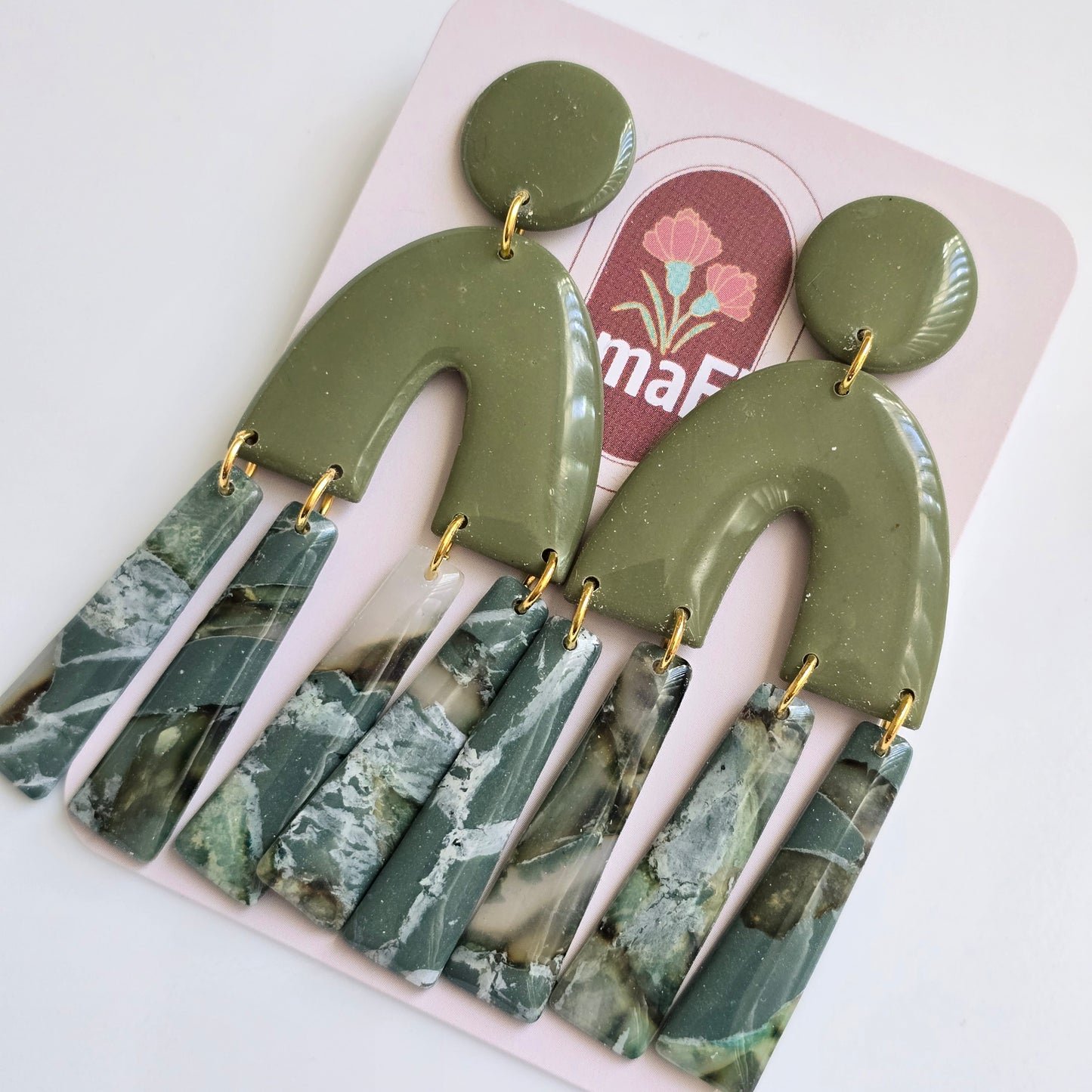 Arco Dangle Earrings in earth greens